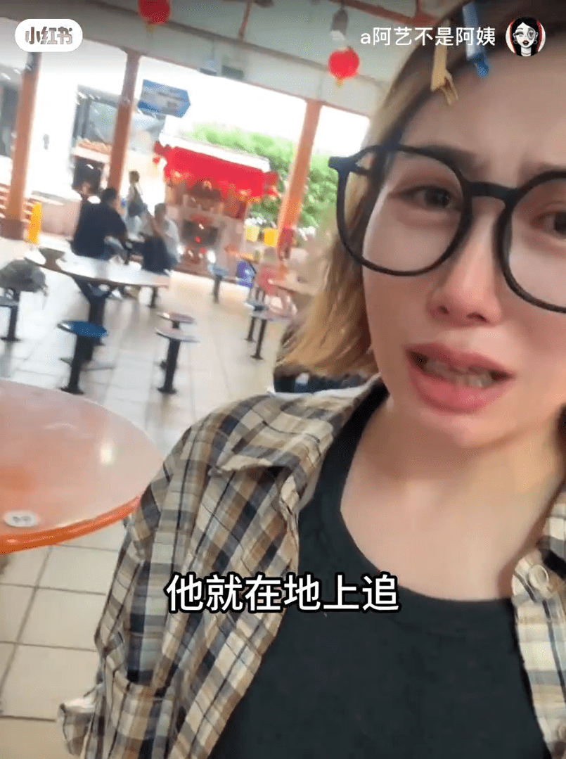 China tourist spots pigeon at her table in SG