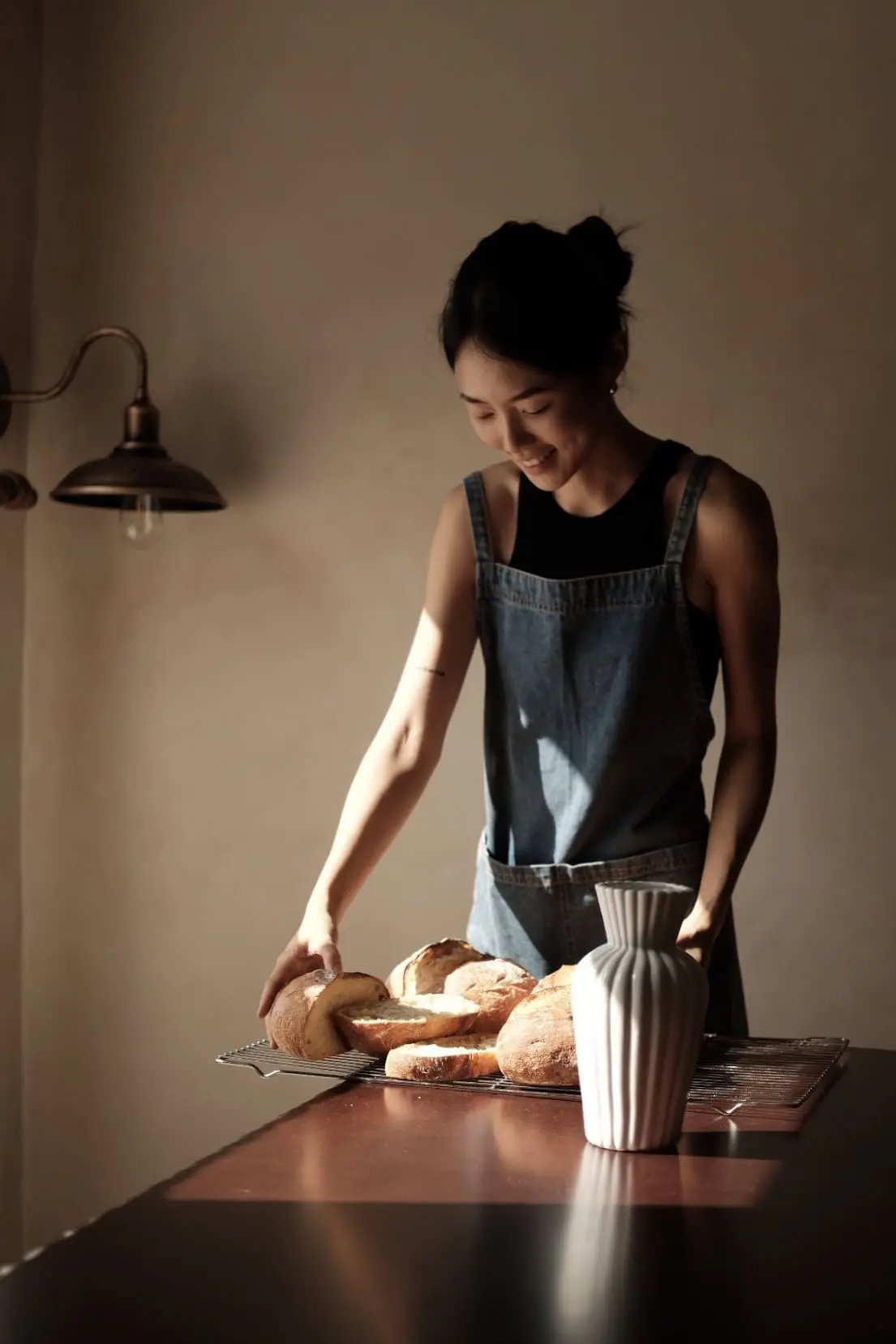 Claire arranging baked goods