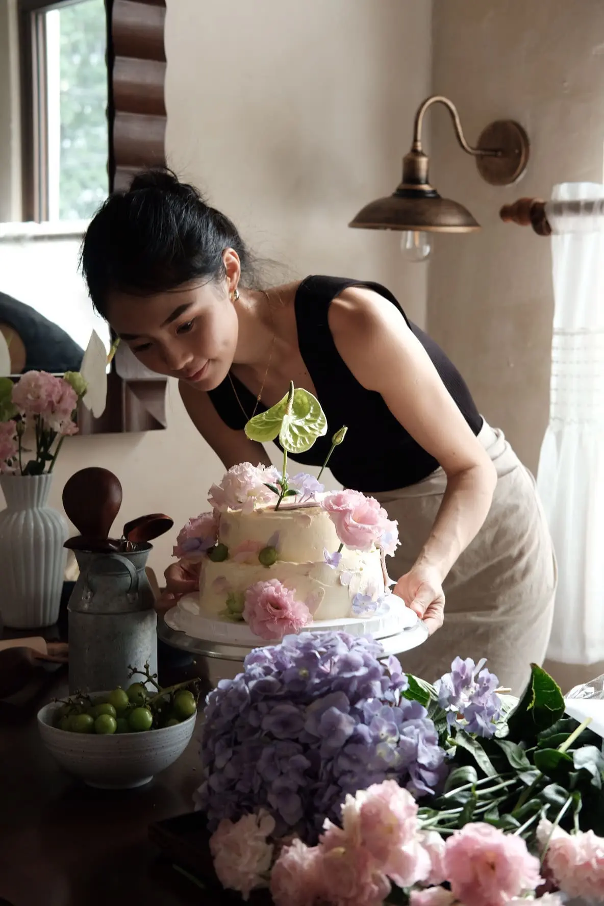 Claire decorating a cake