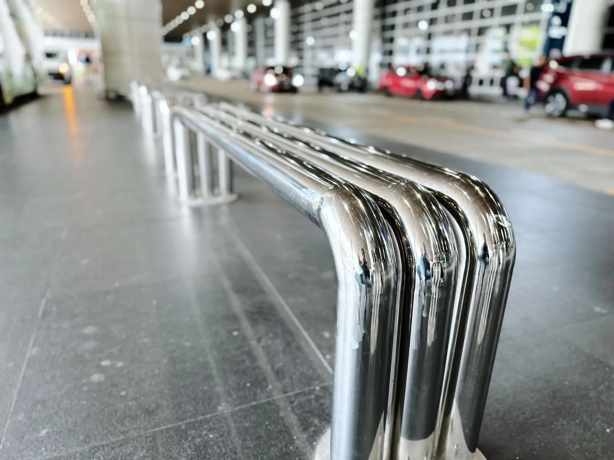 Close-up of metal bench at KLIA