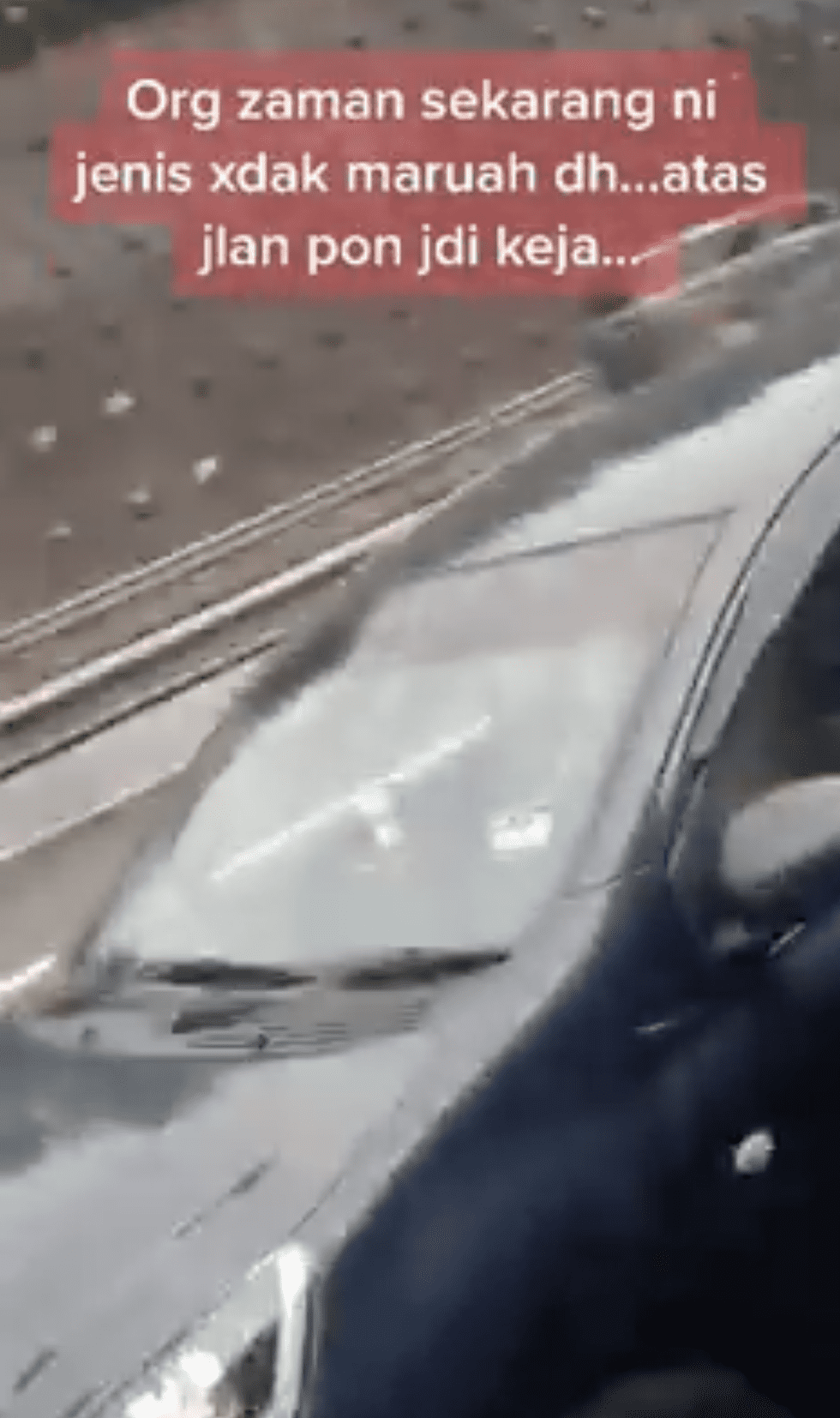 couple caught having fun while driving on highway