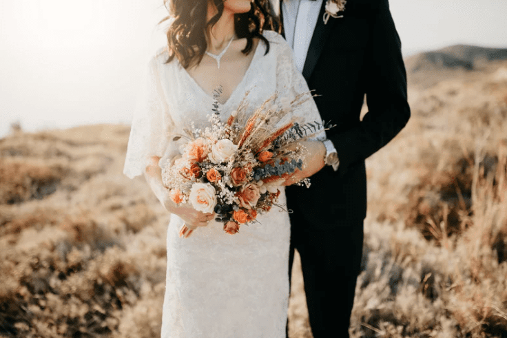 Couple in wedding outfit