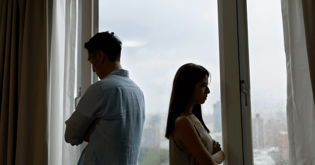 couple sulking at each other