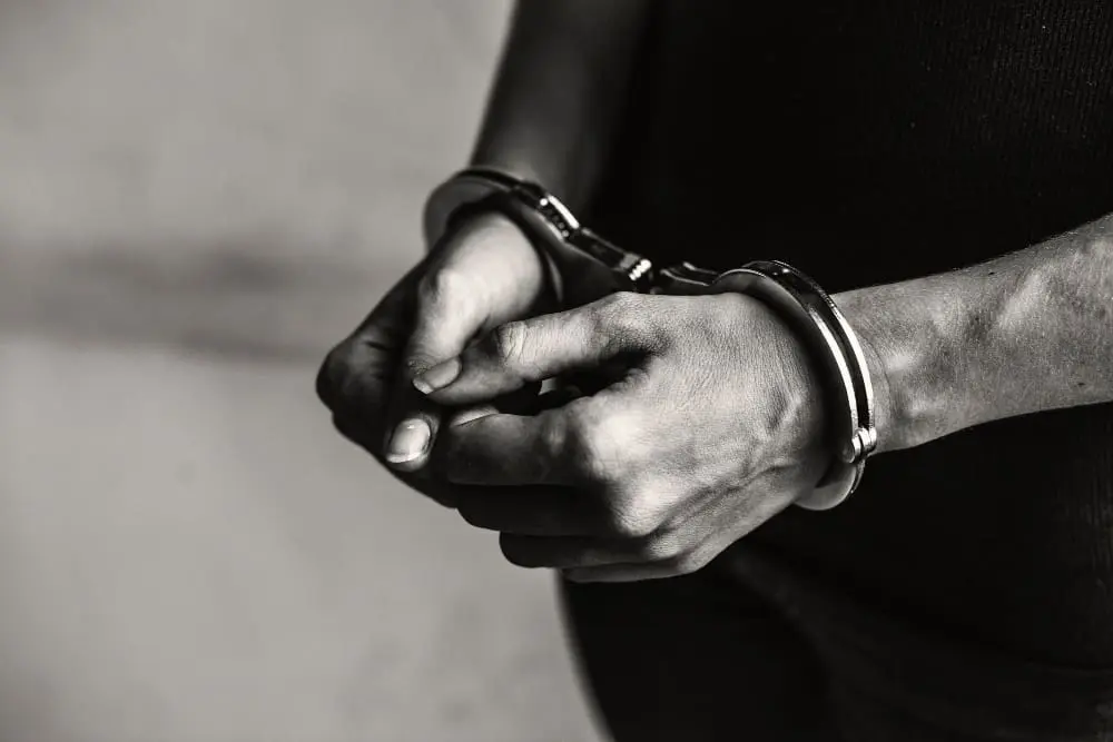 Hands cuffed