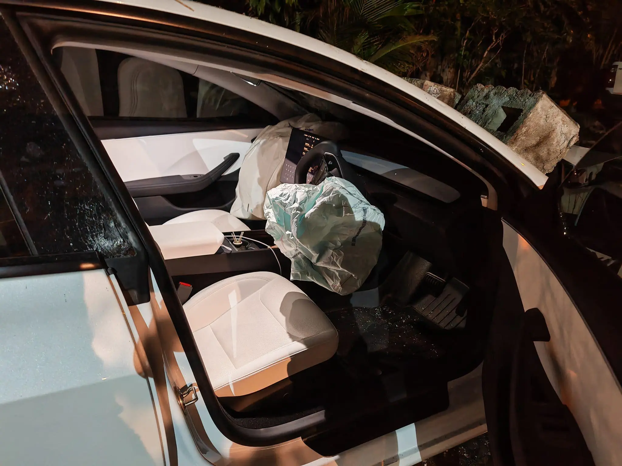 Tesla damaged after ramming into brick wall