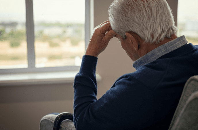 Depressed elderly Asian man