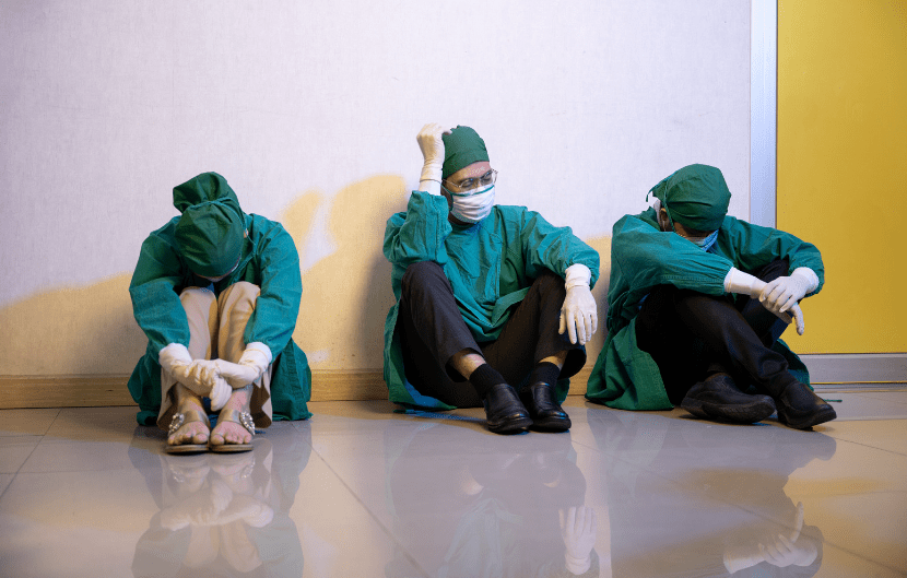 doctors looking exhausted