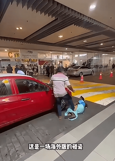 Driver kicking the woman