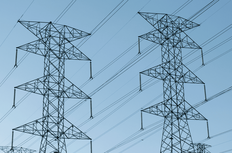 Electricity grid with blue sky bg