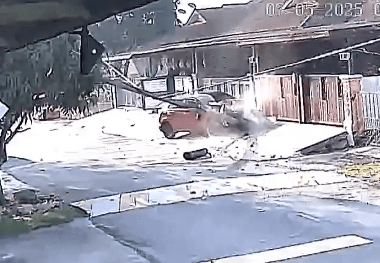 Electricity pole falls after car crash