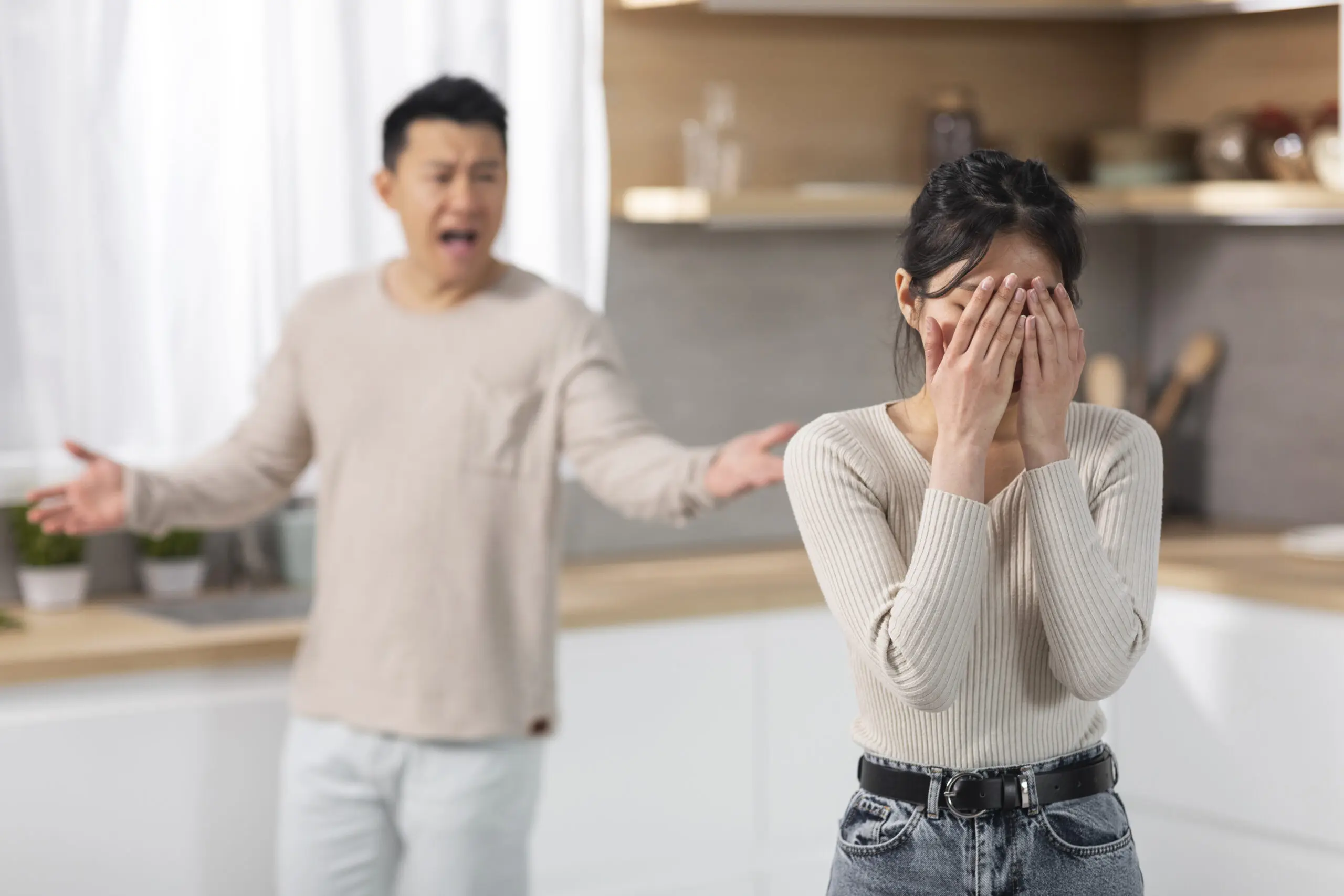Sad and upset Asian couple