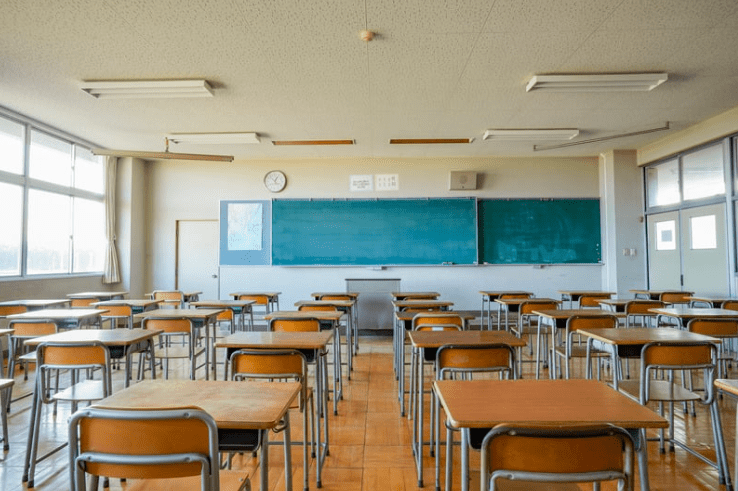 Empty chairs inside classroom