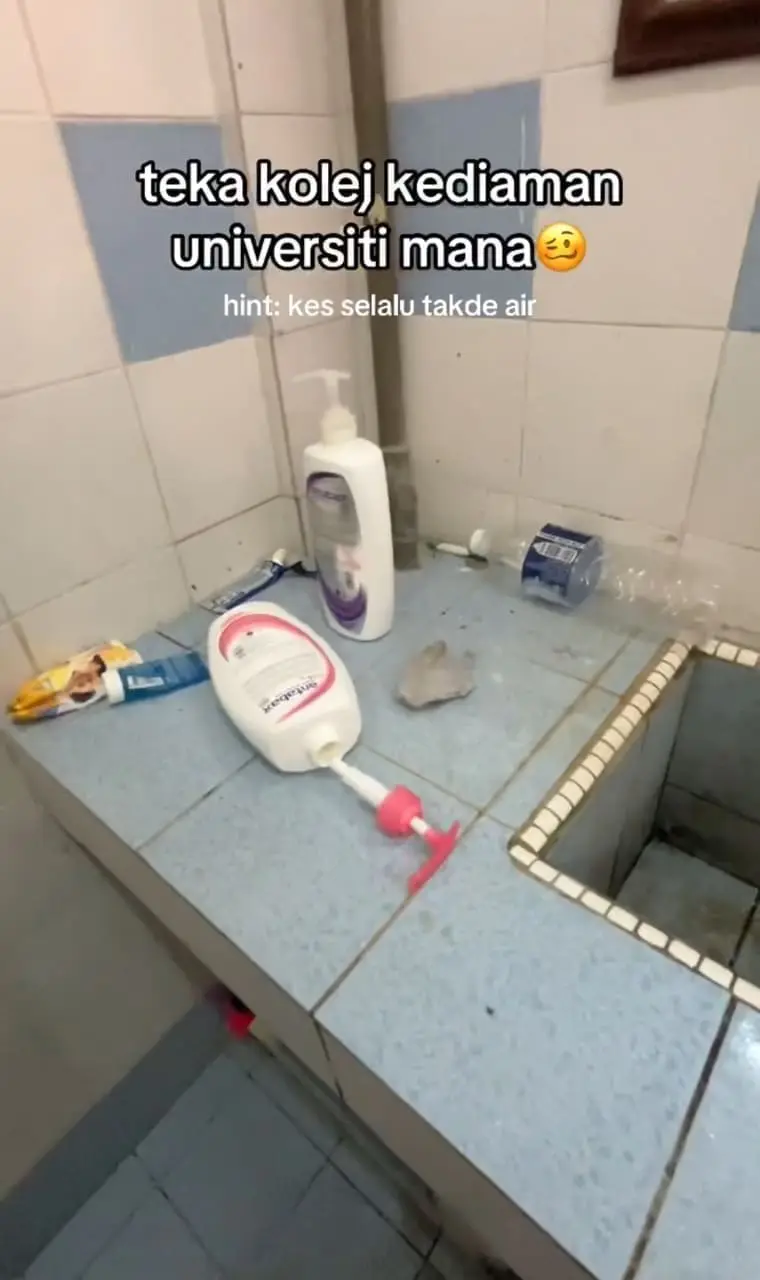 empty shower gel bottle left opened on washing sink