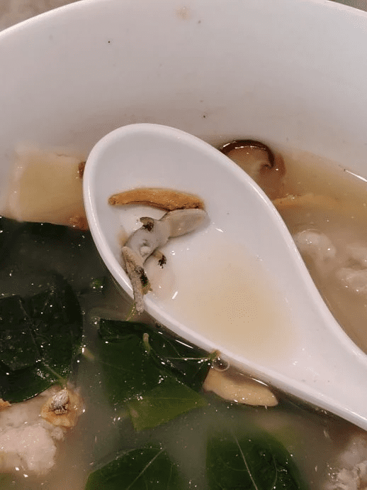 Entire lizard's body found inside food