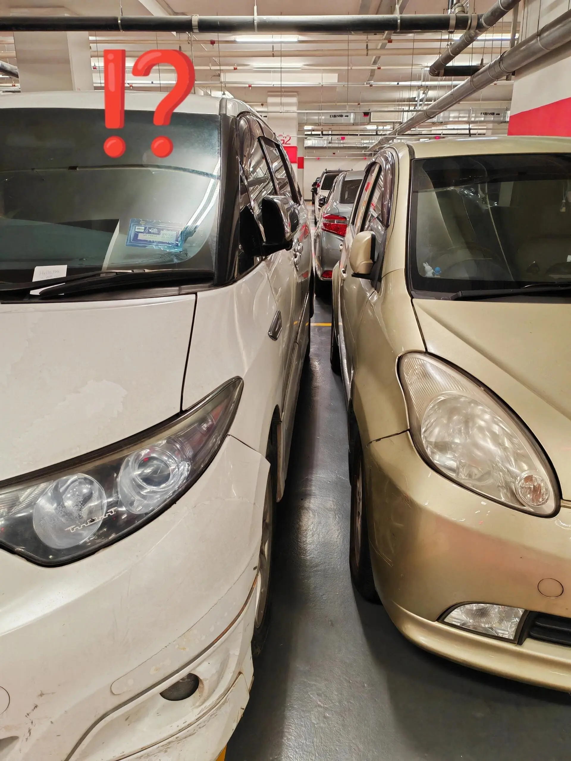 M'sian Shocked To See Estima Squeezed In To Share Parking Spot With His Myvi
