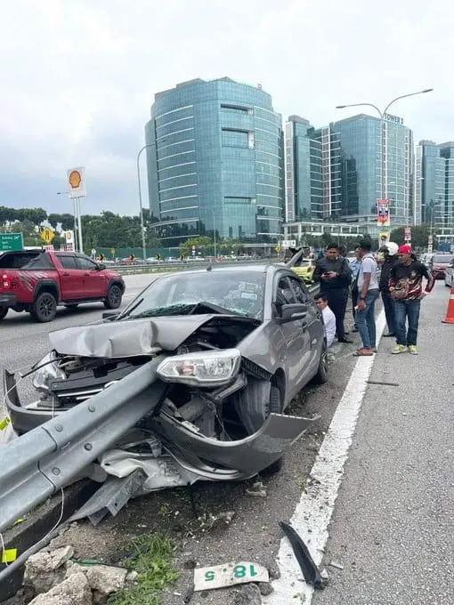 M'sian Man Cheats Death After His Car Gets 'Skewered' Along Federal Highway