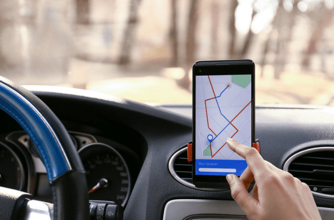 Female driver using GPS