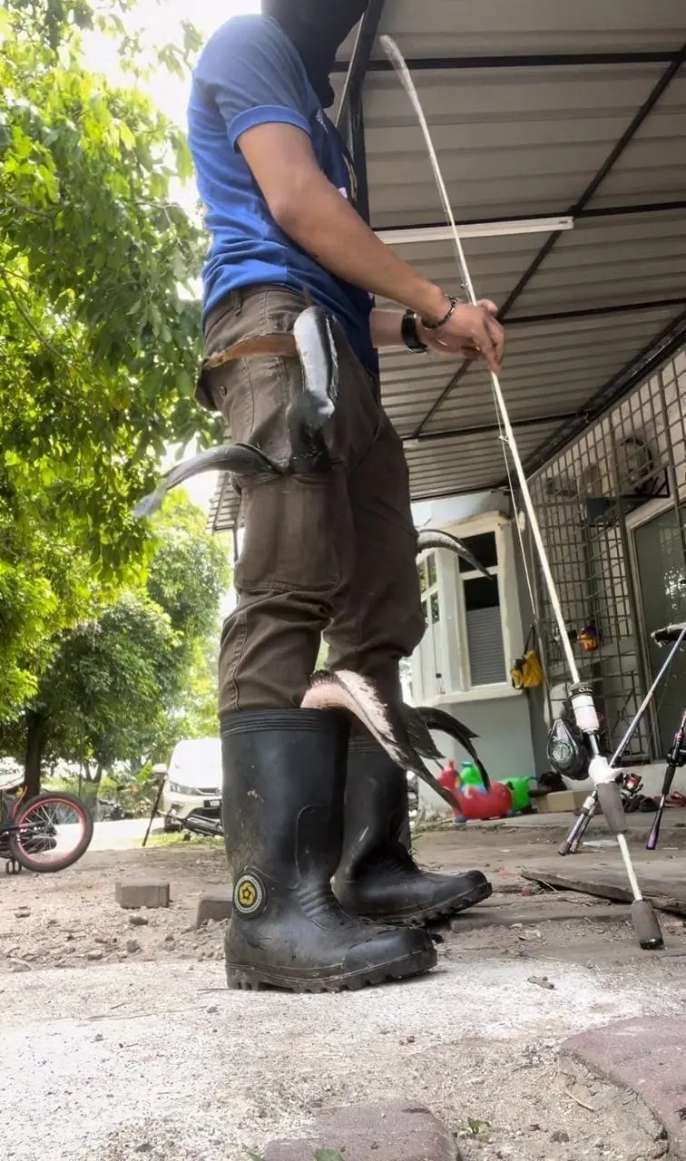 fish in boots and pants