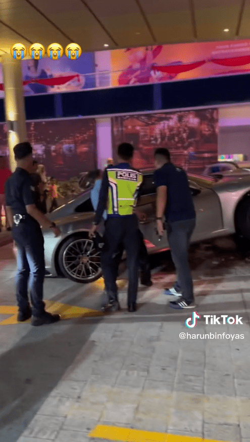 Drunk Porsche driver tries to escape from IOI City Mall