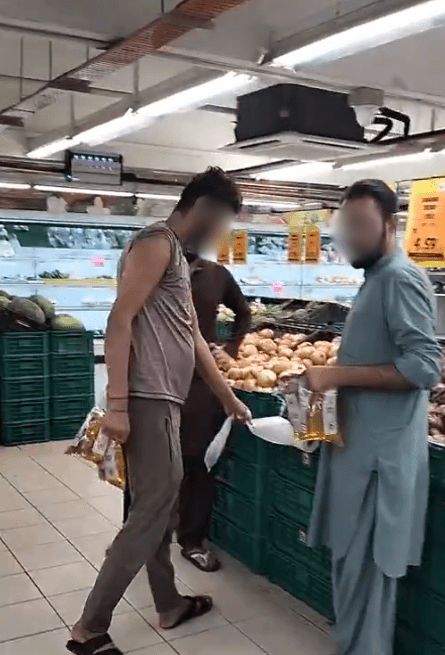 Foreign worker buying subsidized oil