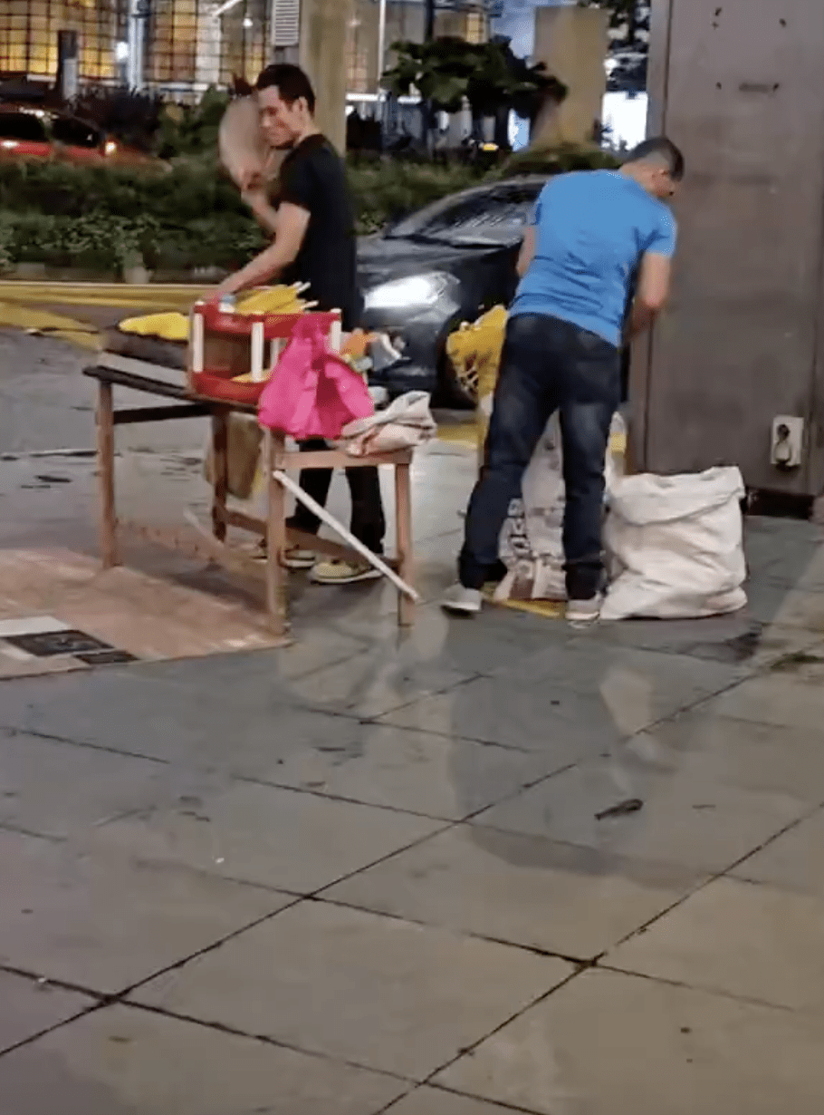 Foreigner spotted selling grilled corn outside KLCC