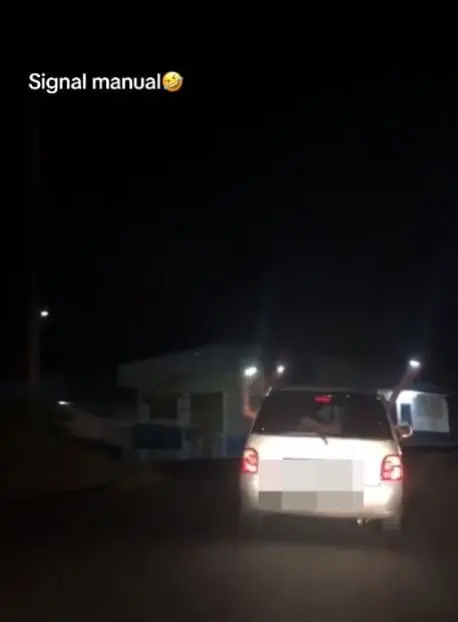 friend waving flashlights