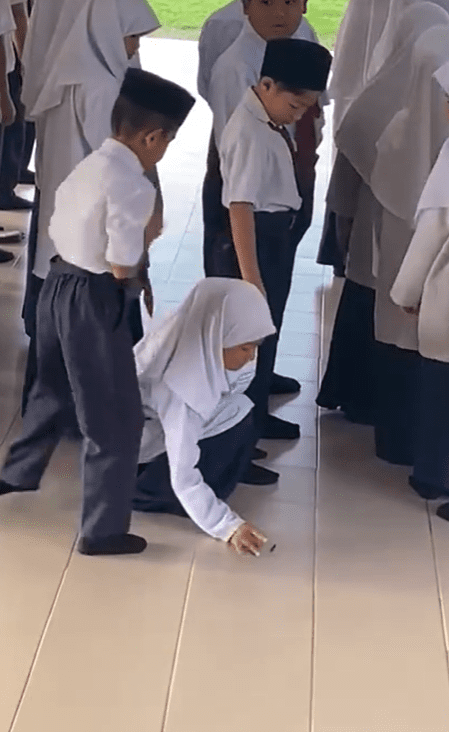 Girl student help flick away a bug Screenshot 2025-01-15 183032 (2)