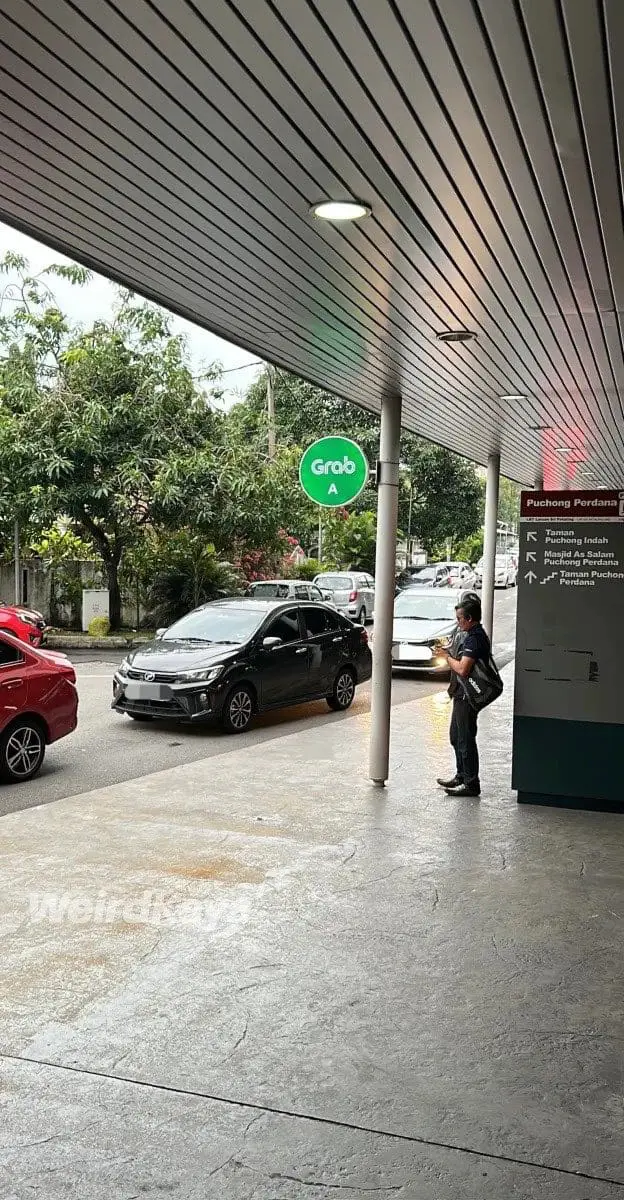 grab car ehailing waiting area grab sign