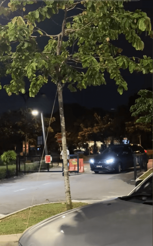 Guard telling a visitor to leave park