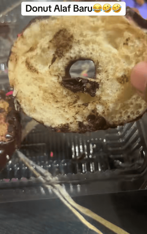 Hakim shows halved doughnut