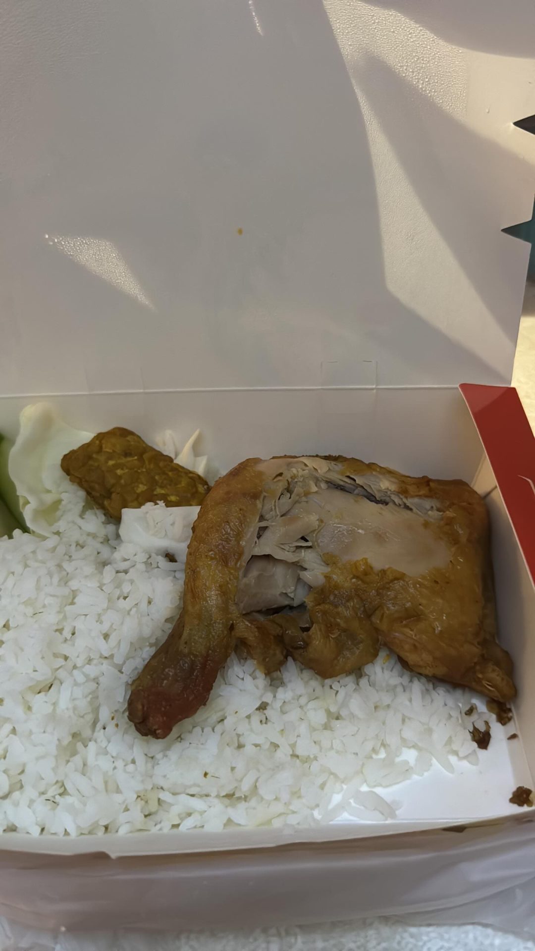 Half-Eaten Chicken in a box