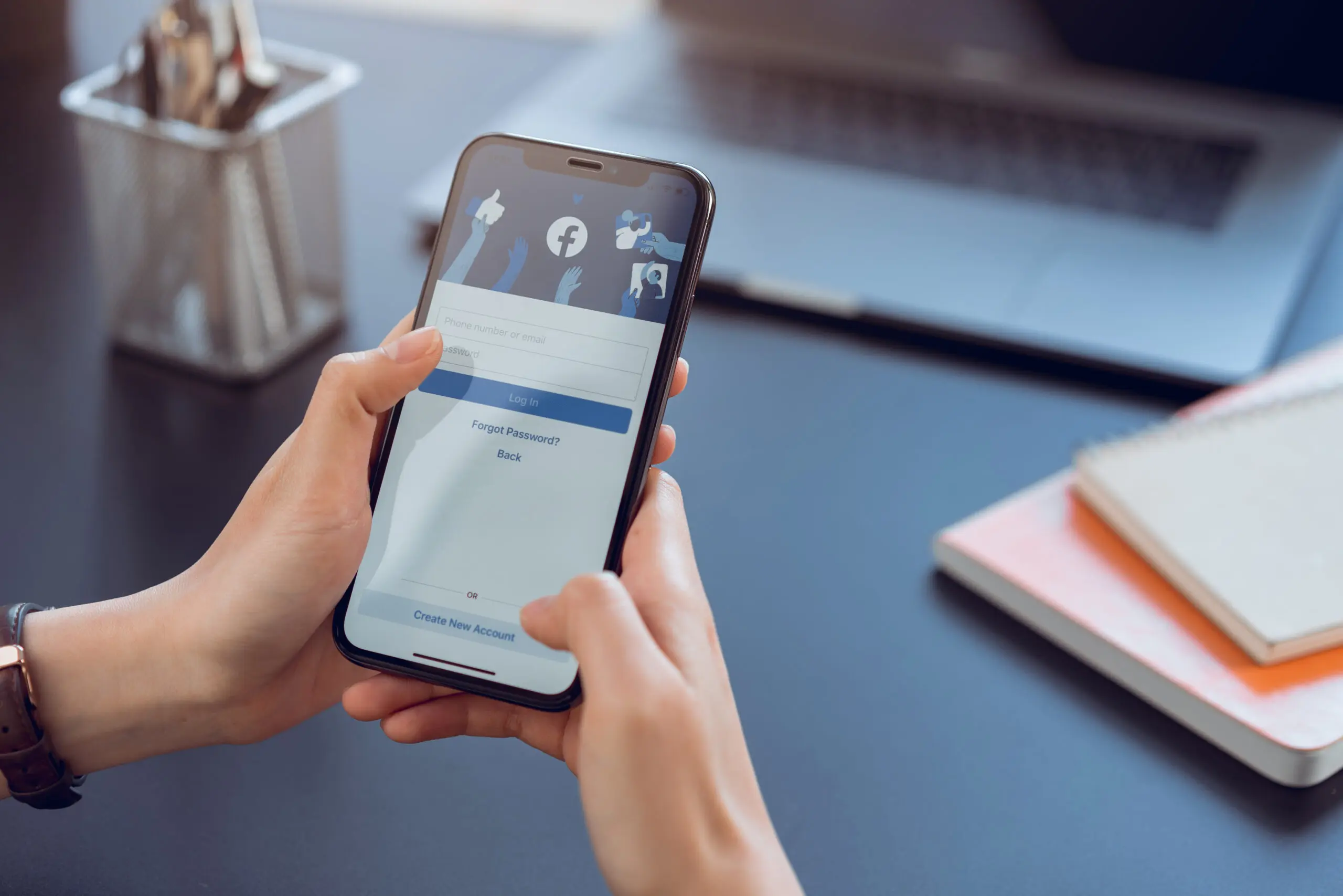 A person logging into Facebook messenger