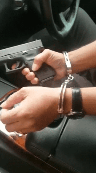 M'sian Man Poses With A Gun While Handcuffed, Now Remanded For 4 Days By Police