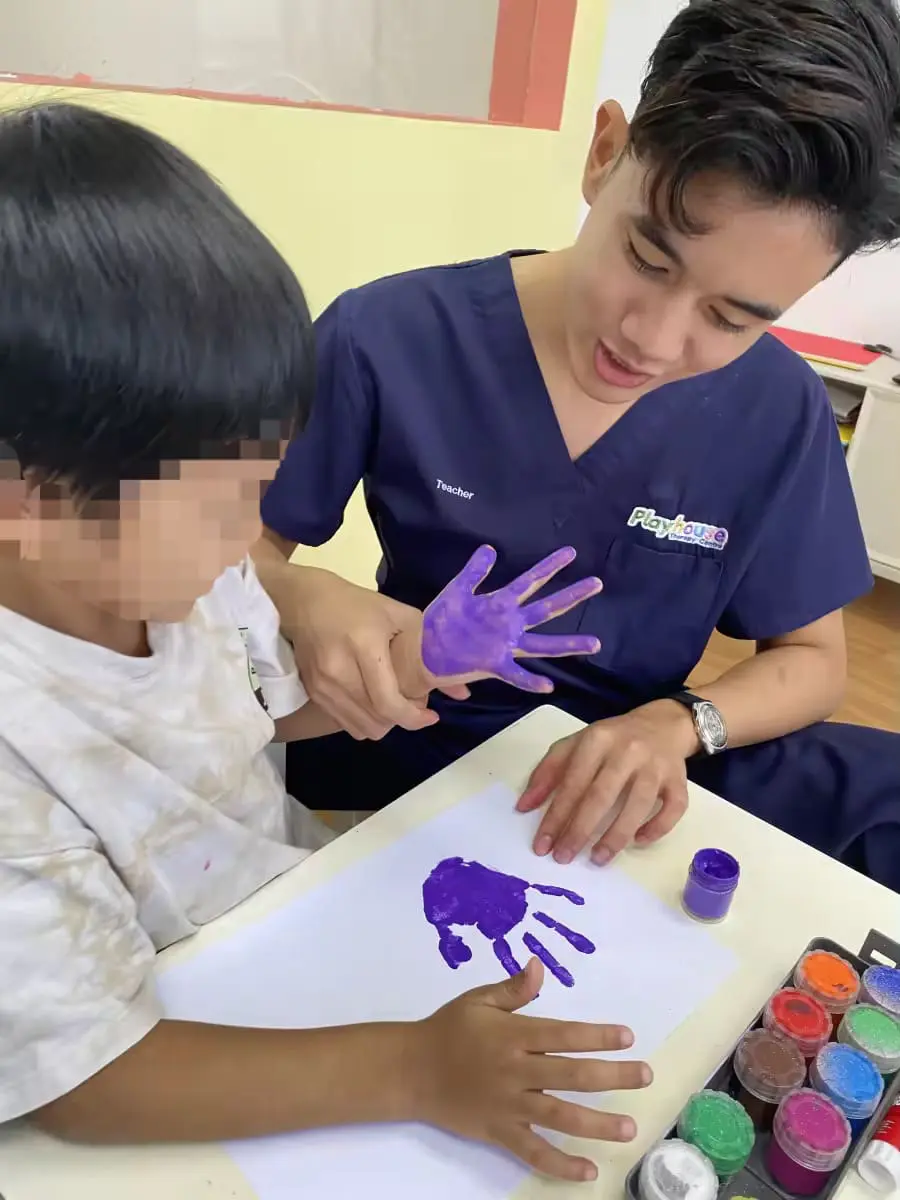 Haqim doing arts and craft