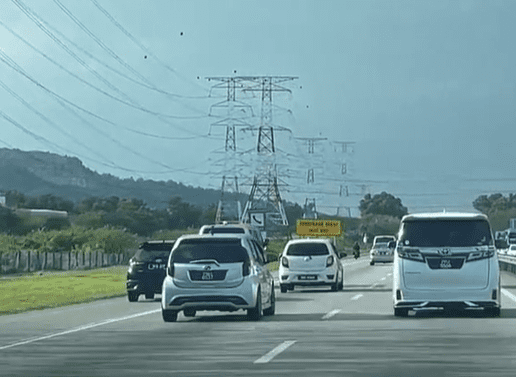 Hearse driving in fast lane