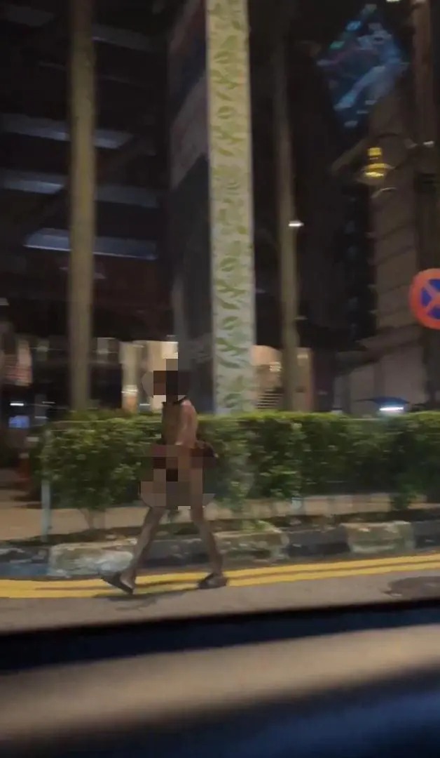 homeless man walking naked at kl
