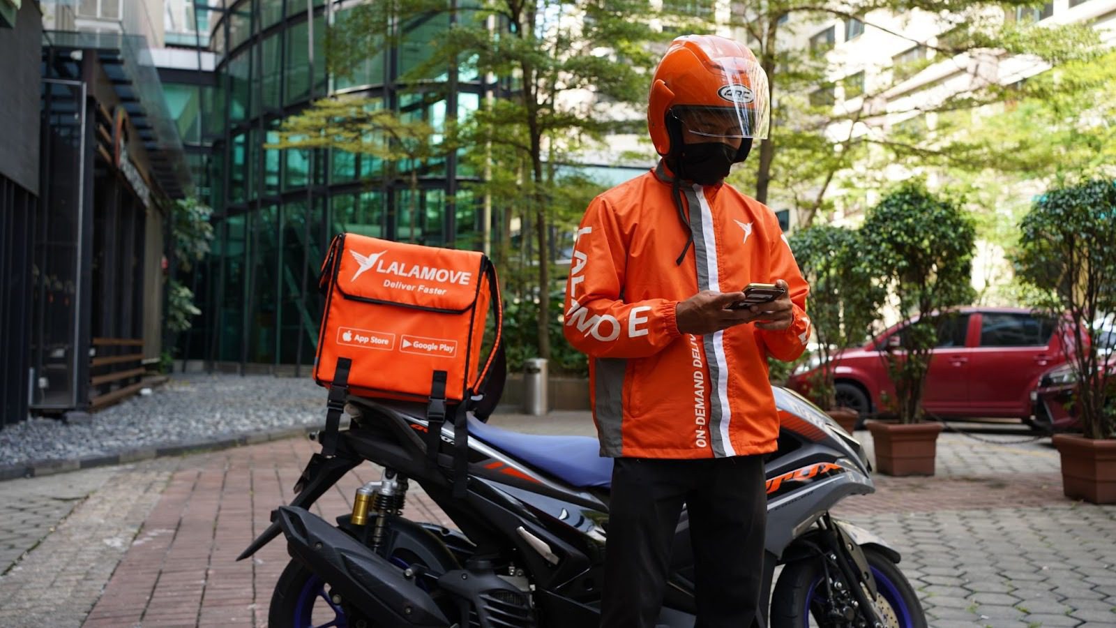 rider looking at his phone