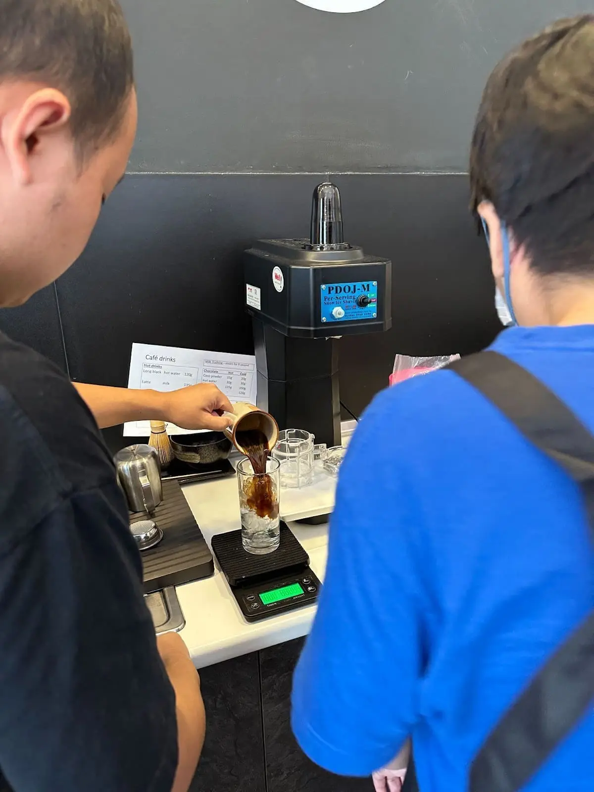 United Voice members serve at cafe