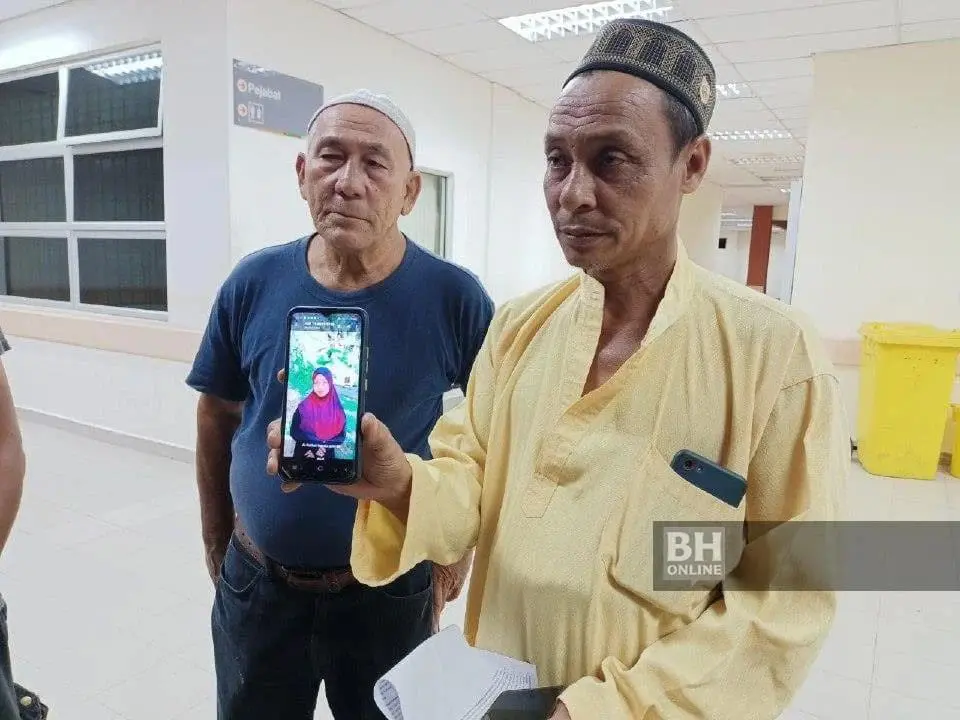 Nur Asyqin Qistina M Nor Zawaw's father