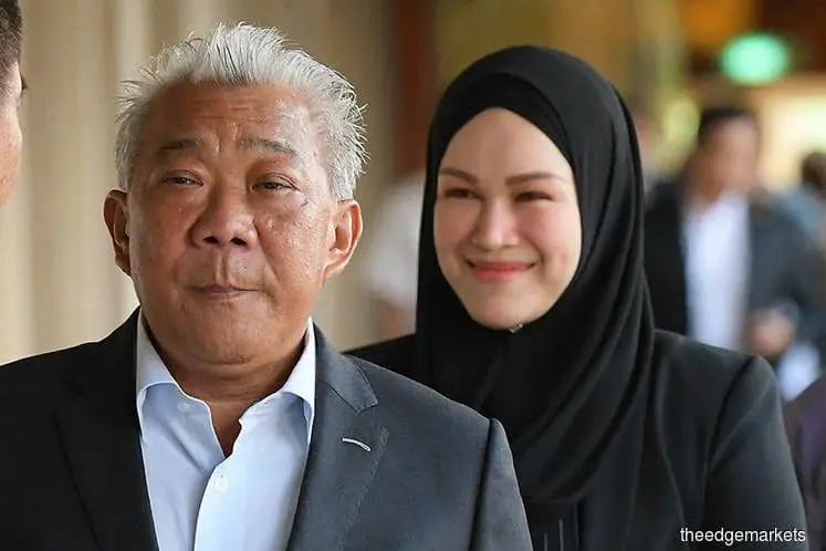 Datuk Seri Bung Moktar Radin and his wife Datin Seri Zizie Izette Abdul Samad