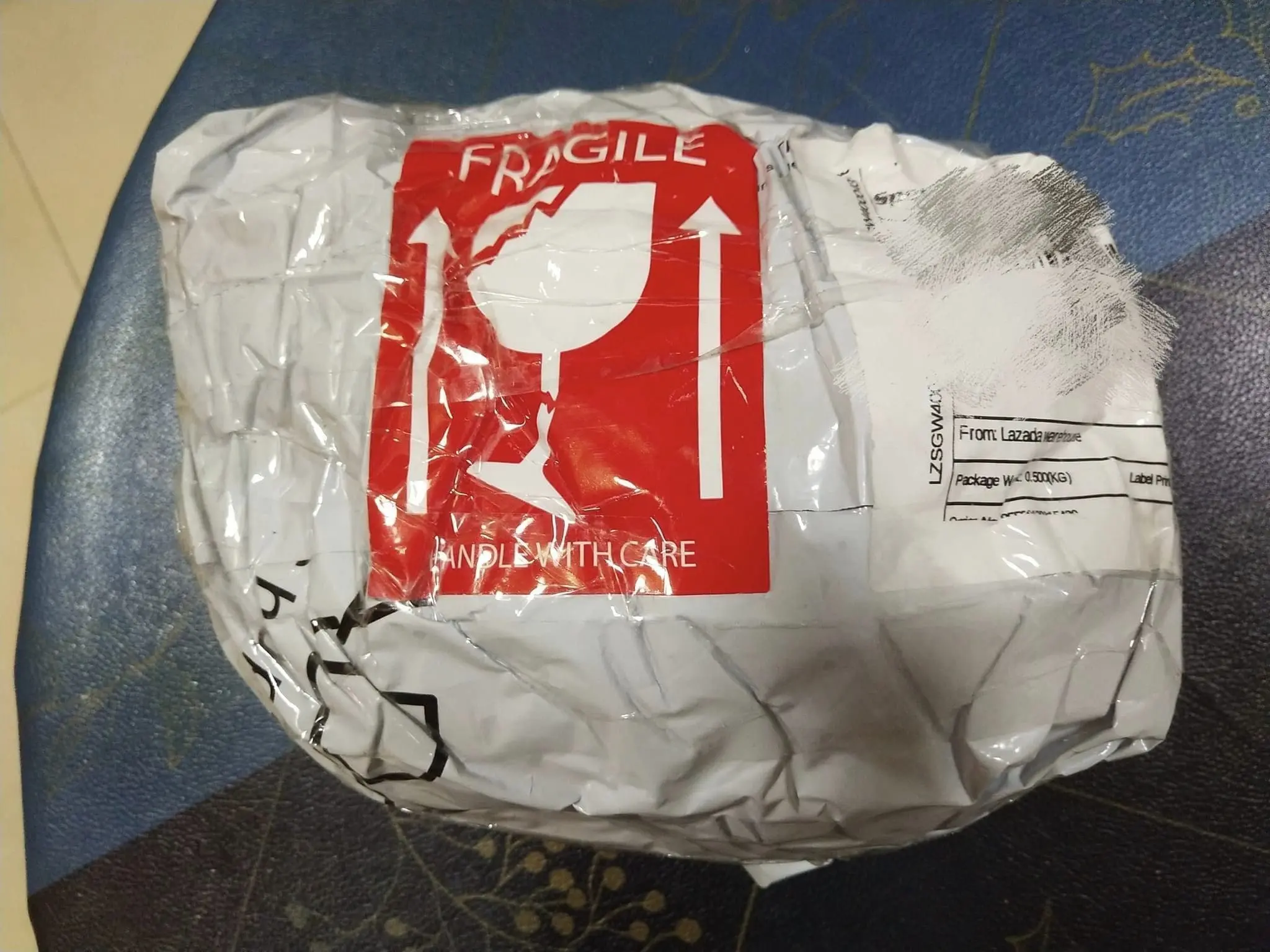 S'porean Woman Who Purchased An iPhone Loses RM5.2k After Receiving An Empty Box From Speedpost Courier