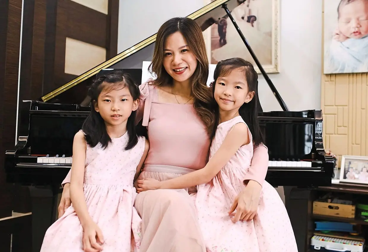 Ulrika Lee Yuen Thong and Felice Lee Ying Theng with their mother