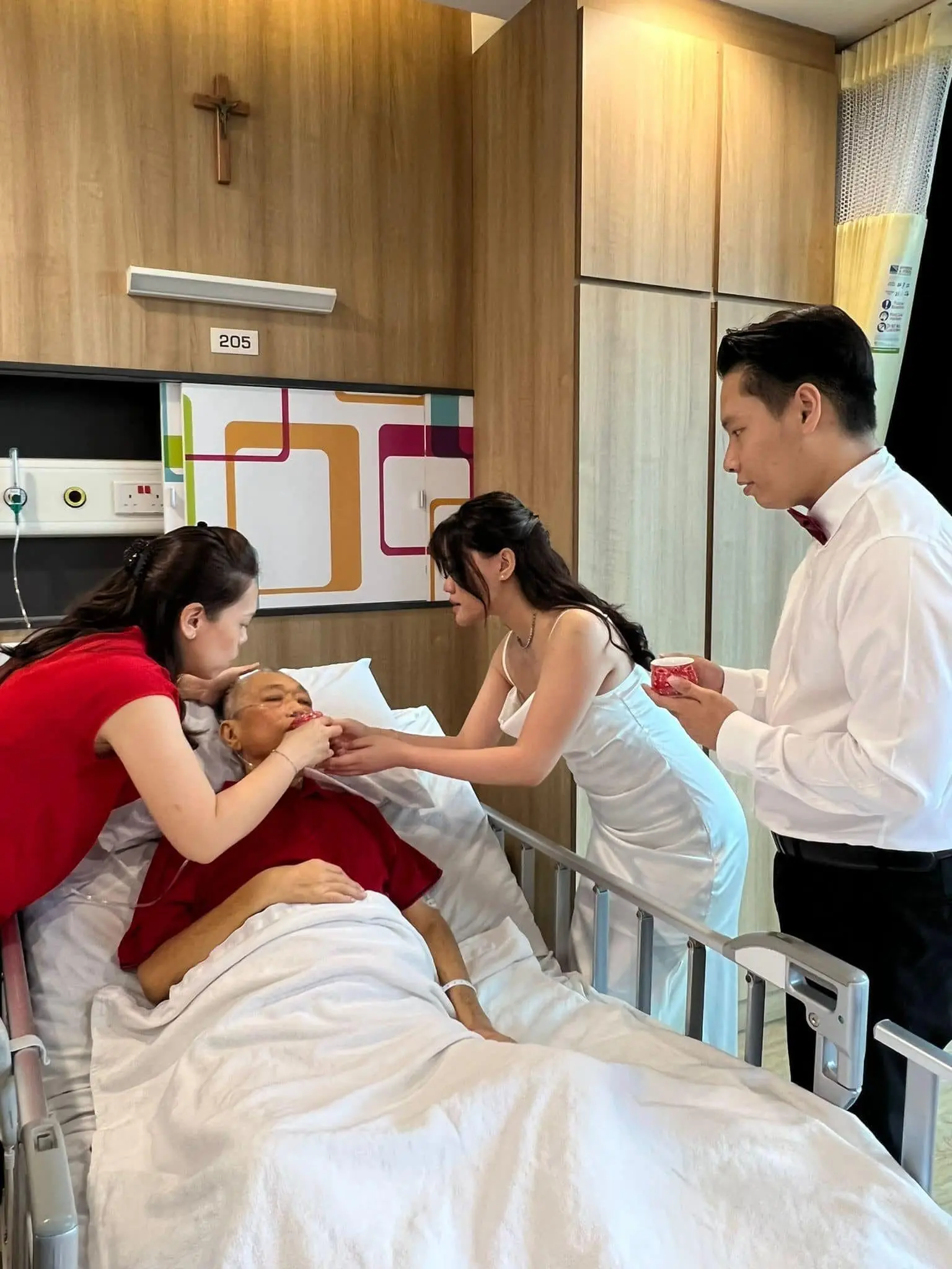 Phoebe serving tea to her father