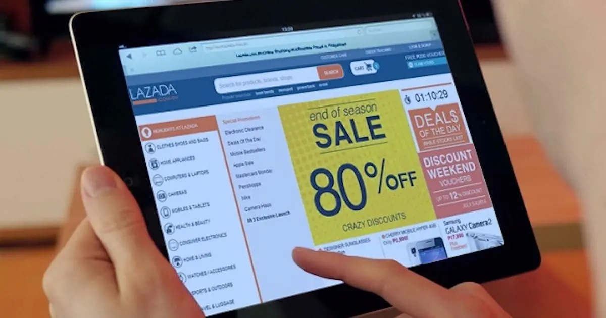 A person using Lazada on tablet
