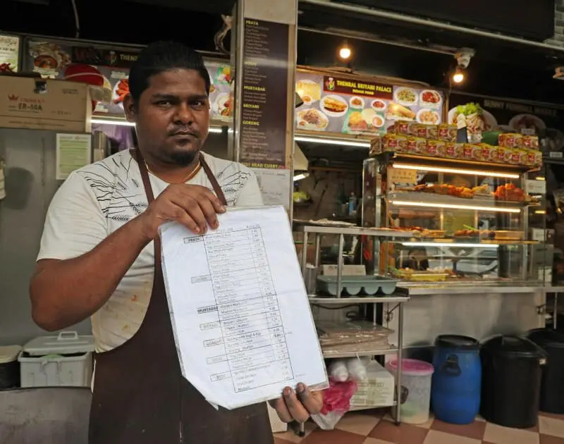Thenral Briyani Palace employee showing price list