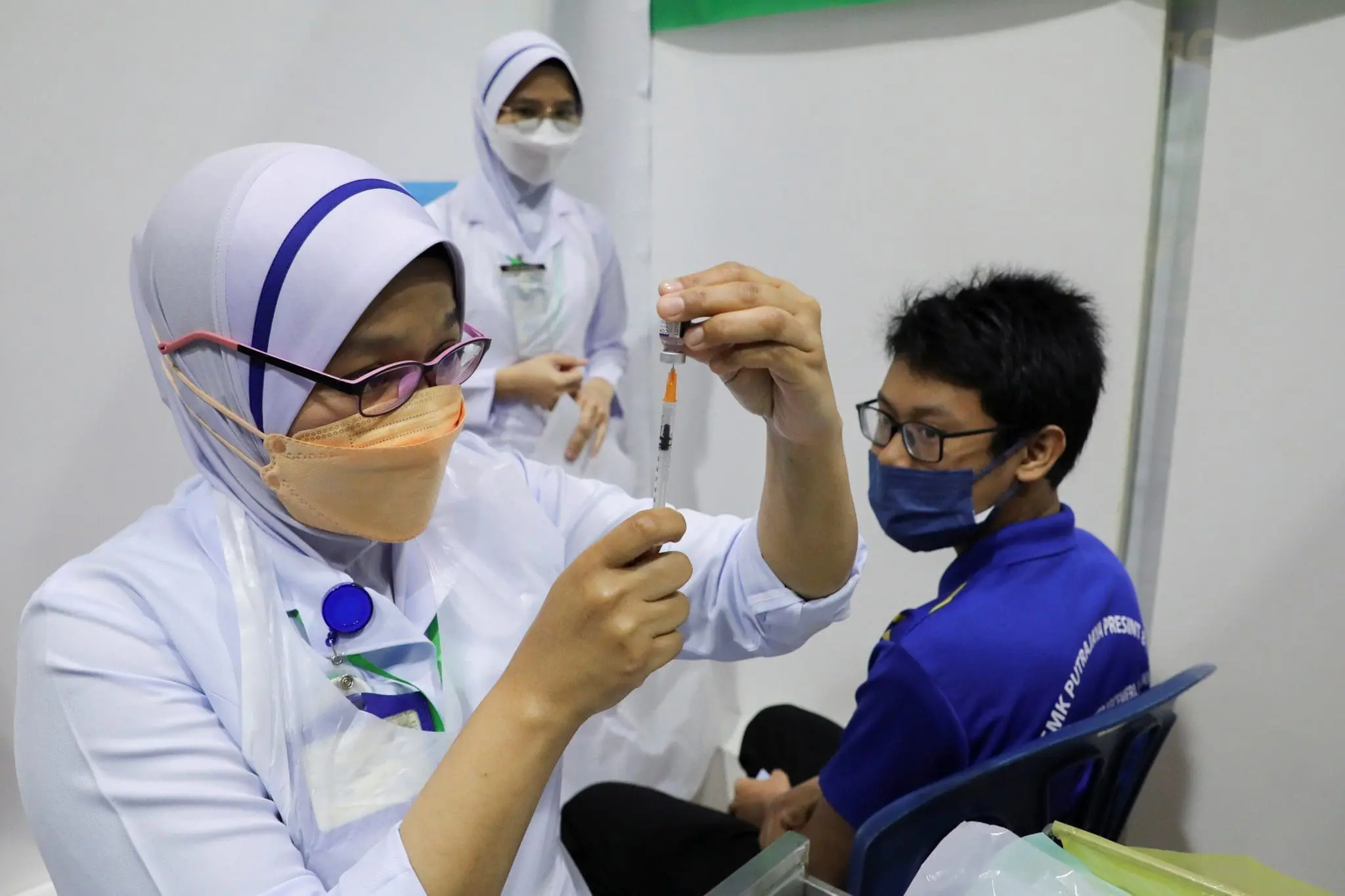 Nurse giving the Covid-19 vaccine