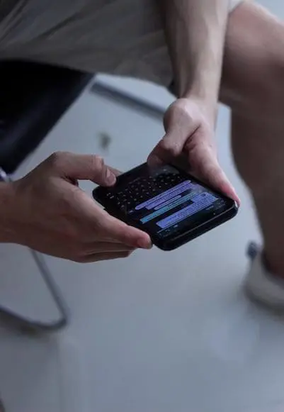 Man using WhatsApp on his phone