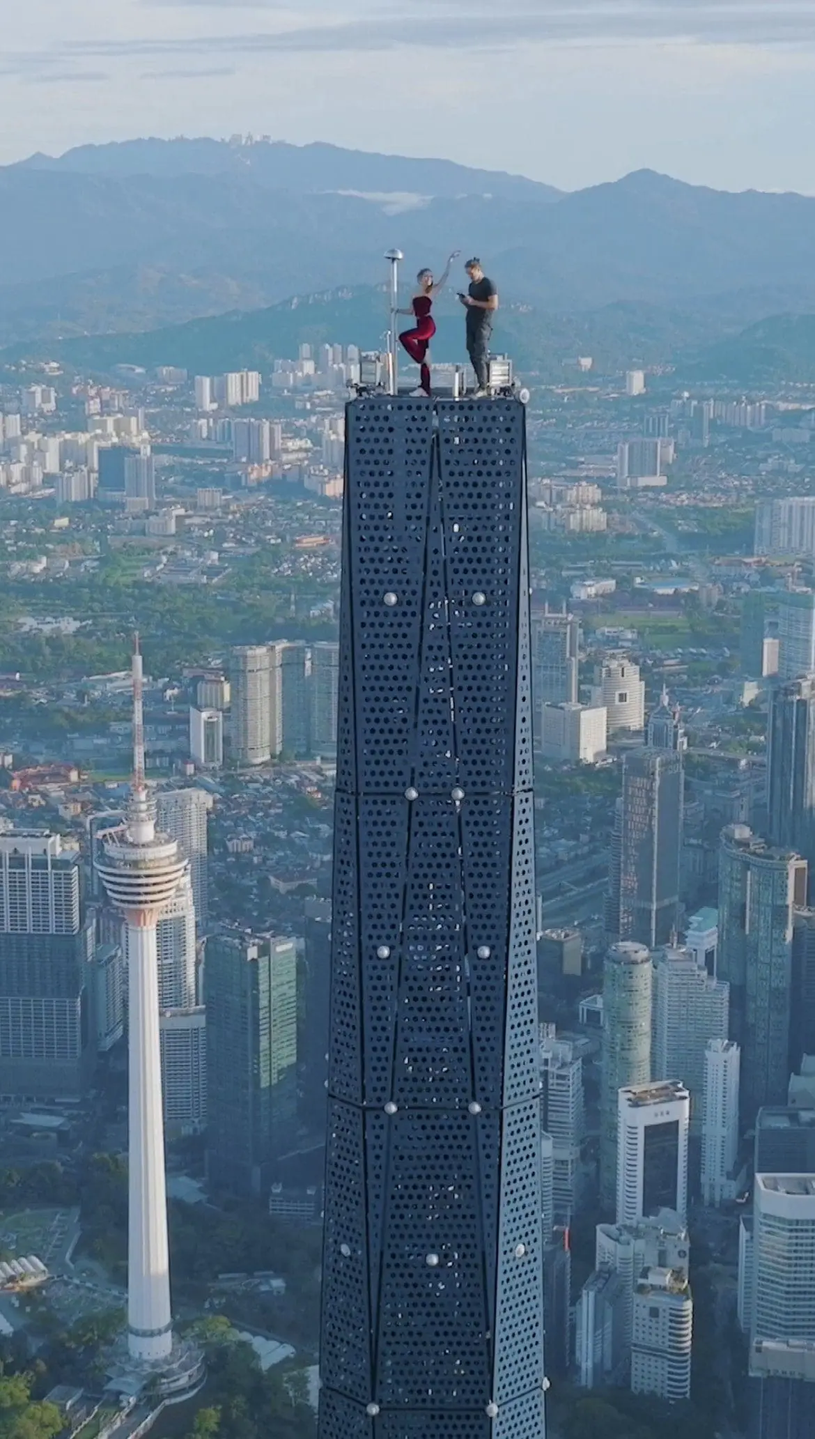Daredevil Couple Climb The Top Of Merdeka 118, Netizens Question The Security