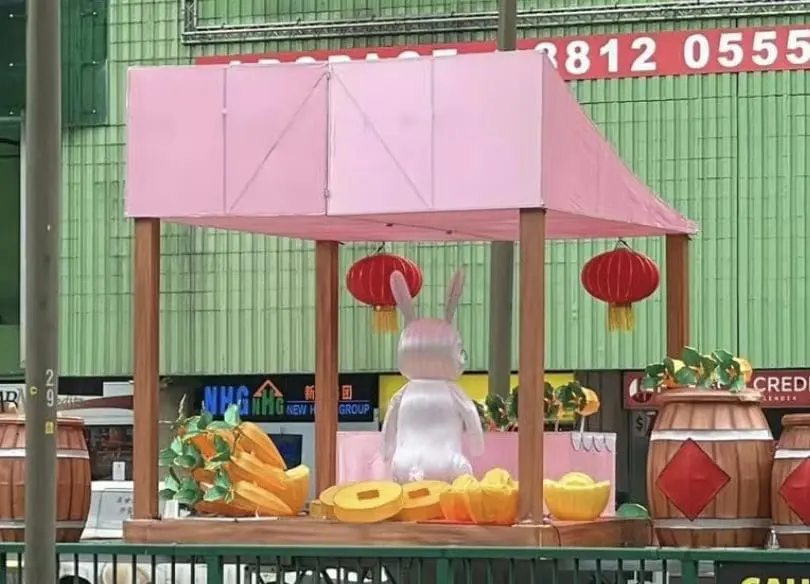 pooping CNY rabbit mascot