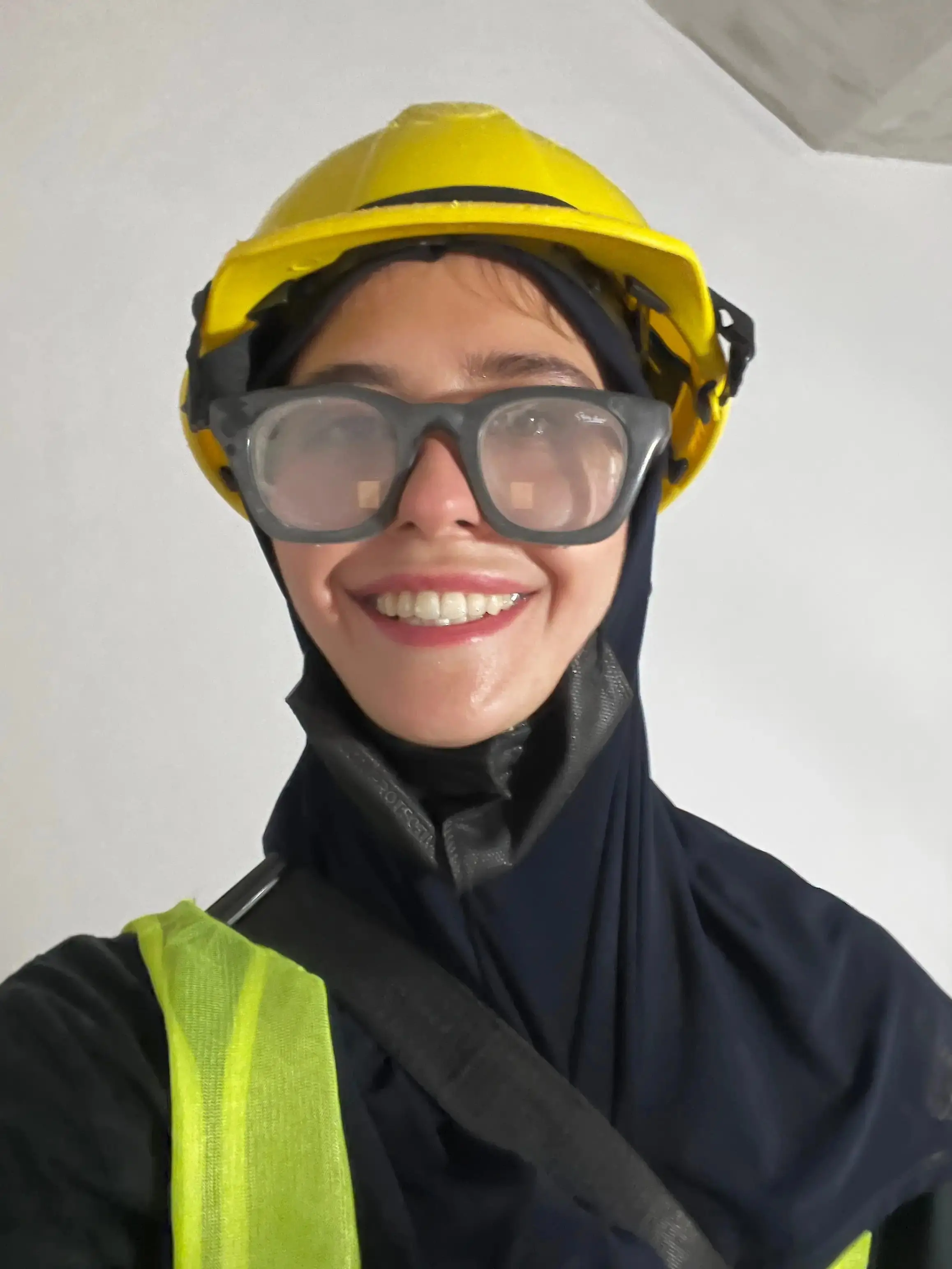 Angela Nikolau disguised as construction worker
